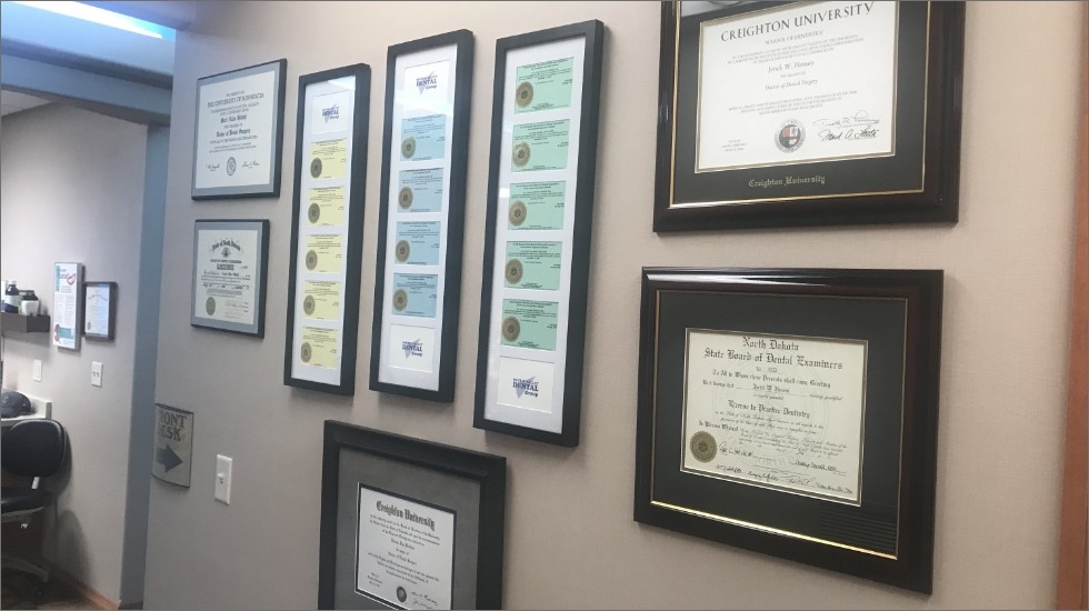 Dental office awards and dentist degrees and certifications