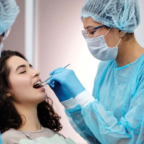 Woman at dentist for dental procedure