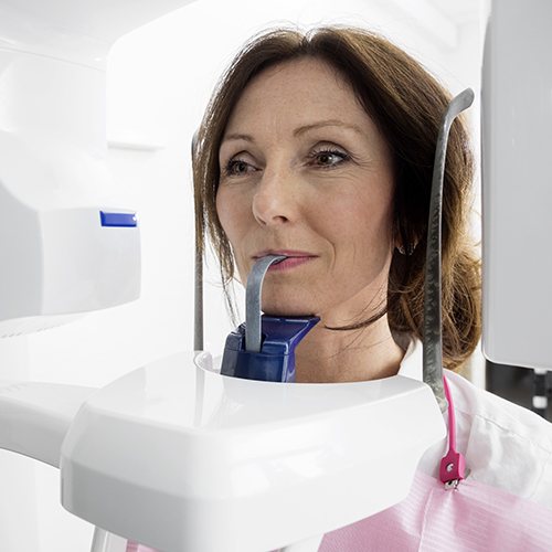Woman receiving 3 D C T x-ray scan
