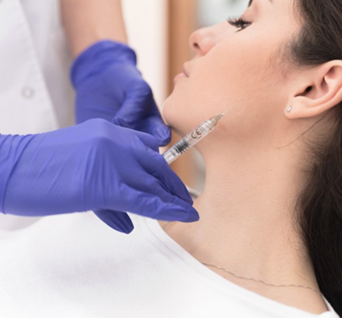 Closeup of patient getting BOTOX for TMJ therapy in Minot