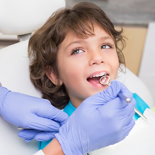 Young child receiving dental checkup