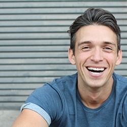 closeup of young man smiling 