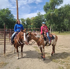 Doctor Brekhus riding a horse