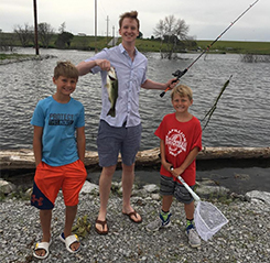 Doctor Brodersen fishing with his nephews
