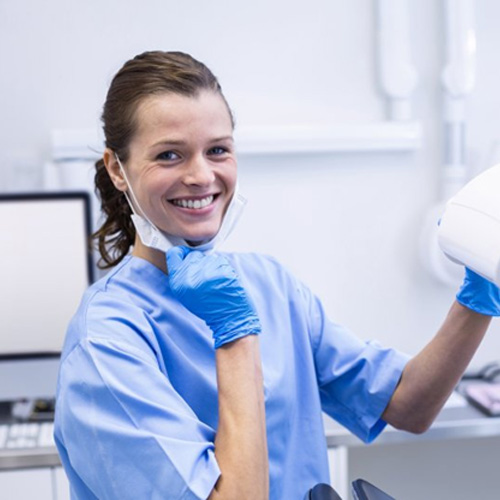 Dental hygienist smiles