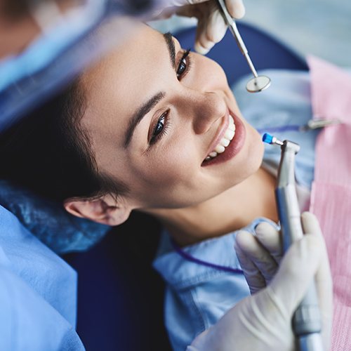 Woman receiving dental checkup