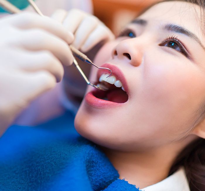 patient smiling during checkup