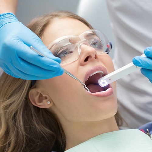 Dentist capturing intraoral images