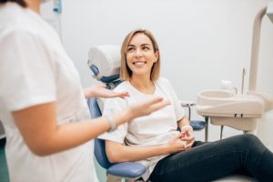 woman visiting dentist in Minot