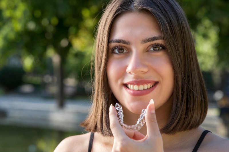 Woman traveling with Invisalign