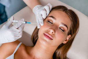 A young woman about to receive BOTOX for TMJ