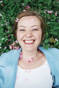 Smiling woman with gaps between her teeth